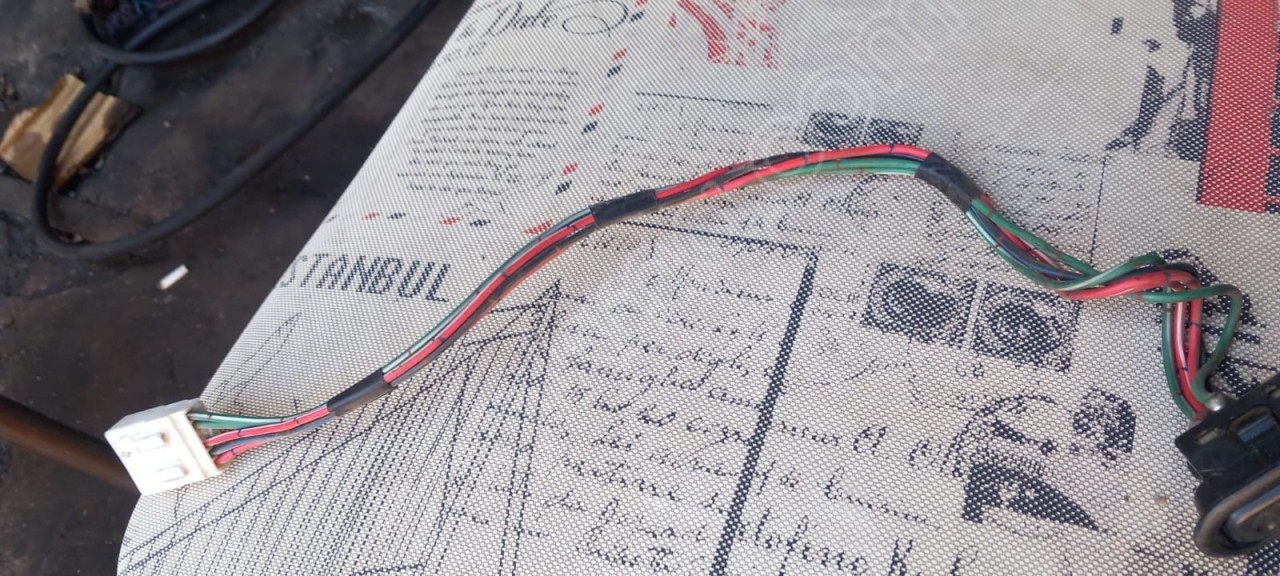 323 sedan cam acma dugmesi